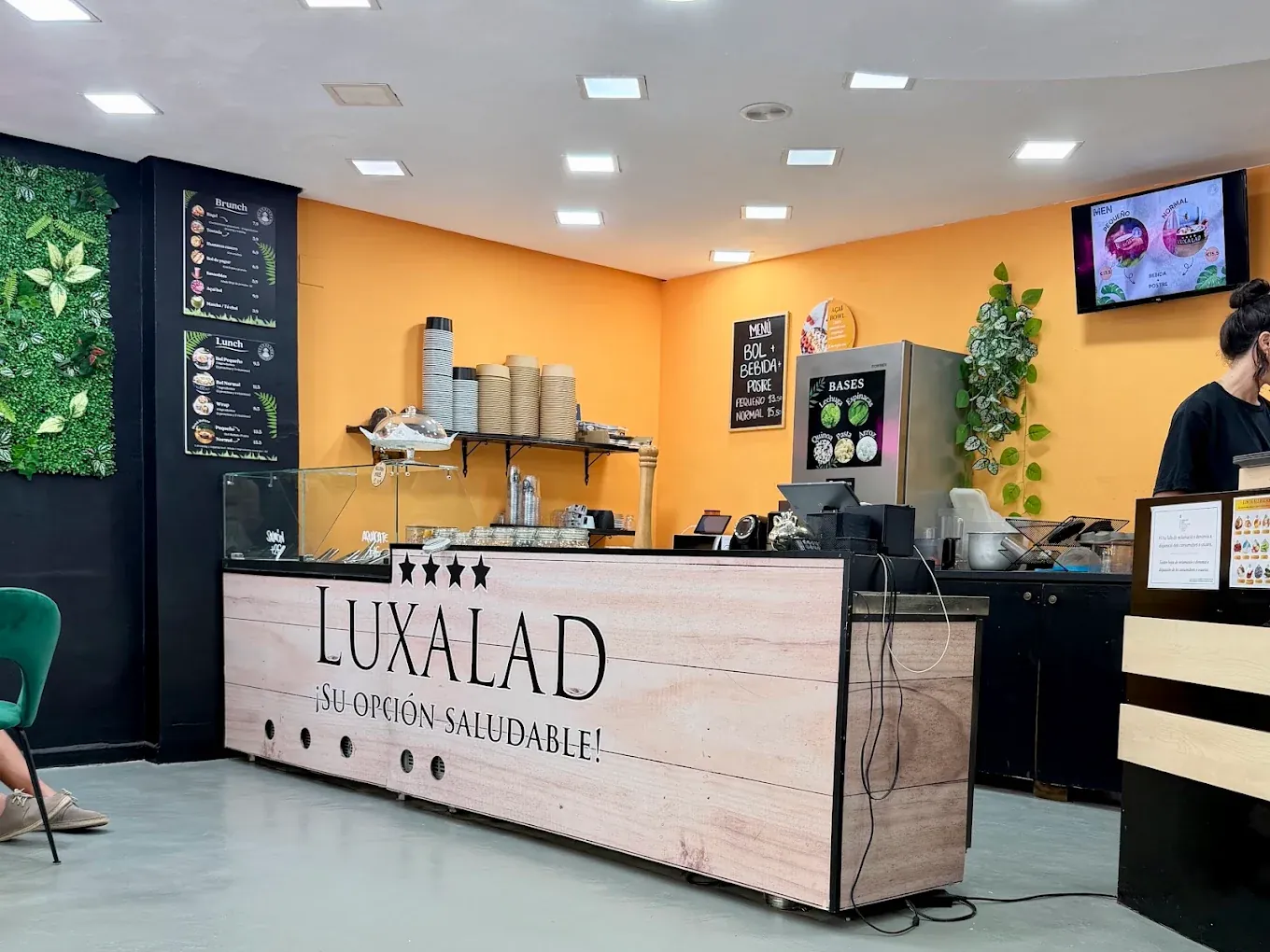 The order counter and menu boards inside Luxalad Ibiza