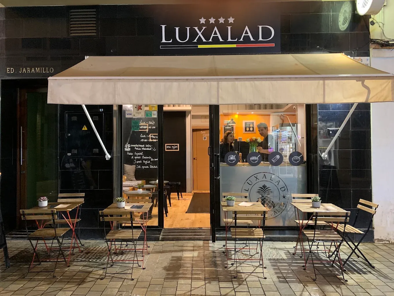The Luxalad shopfront and terrace on Calle Fajardo in Málaga
